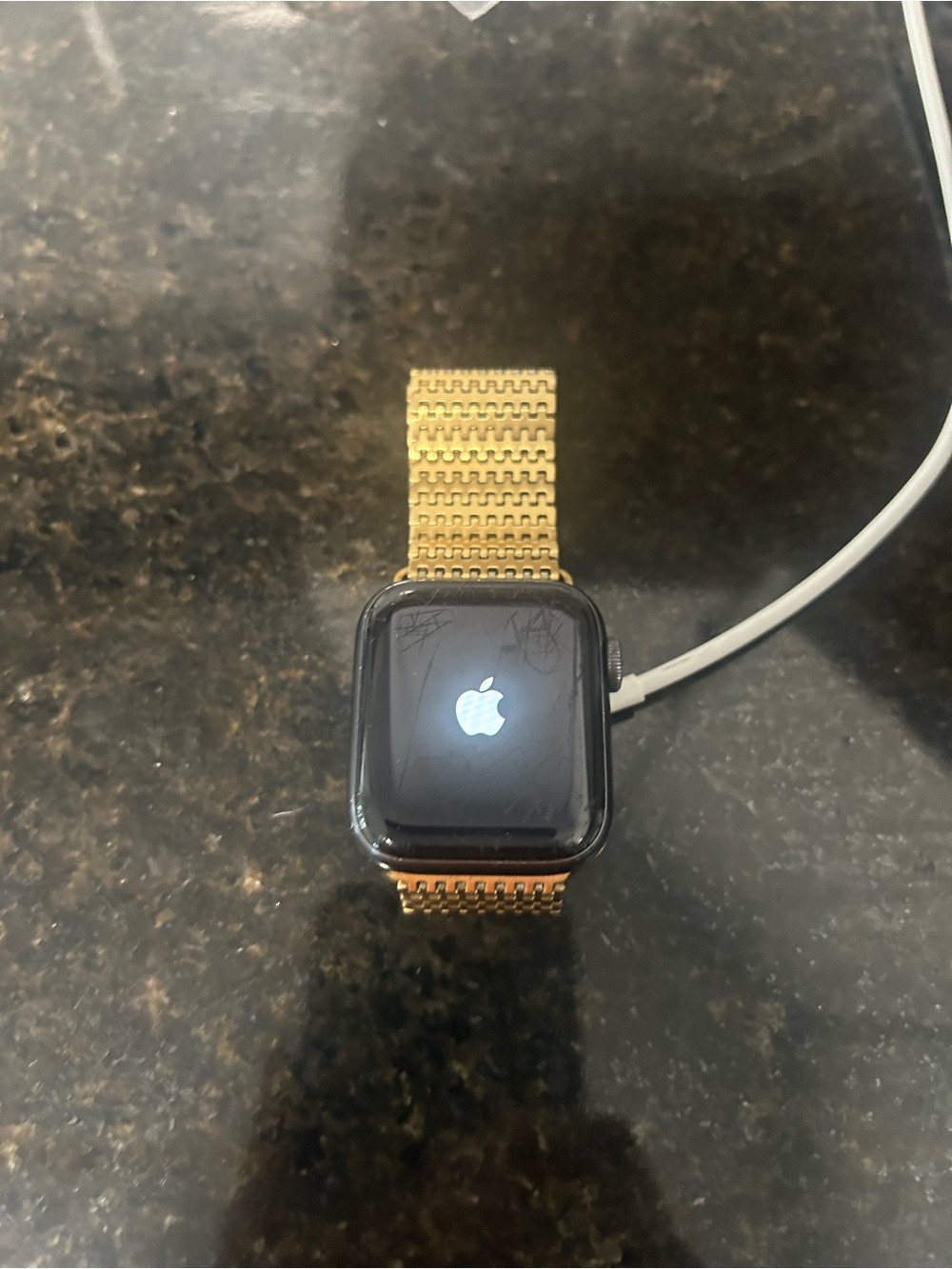 Applewatch set to reset factory settings with Gold band and cover for face